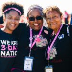 a group of women standing next to each other