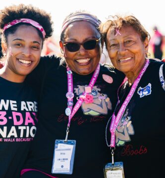 a group of women standing next to each other